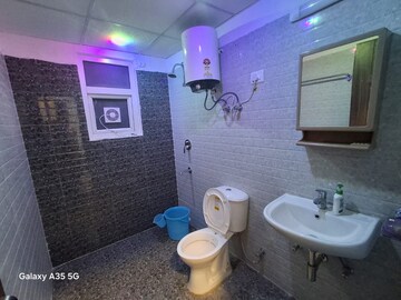 Bathroom in 3 BHK Apartment at NK Sharma Savitry Greens 2, Ghazipur – for Rent