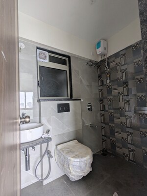 Bathroom in 1 BHK Apartment at Veena Smart Homes, Kandivali West – for Sale