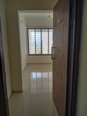 Room in 2 BHK Apartment at Saarrthi Skybay, Mahalunge – for Rent