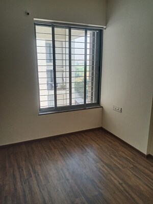 Room in 2 BHK Apartment at Saarrthi Skybay, Mahalunge – for Rent