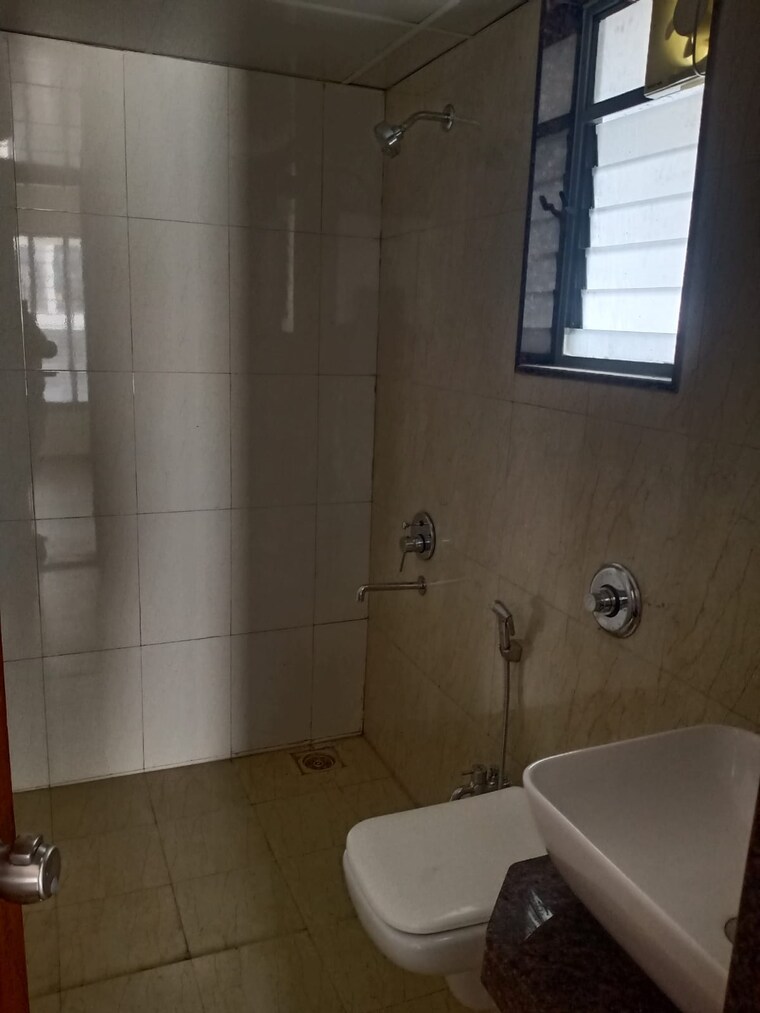 Bathroom, saarrthi-skybay 2 Bedroom 919 Sq.Ft. Apartment In Mahalunge Pune 9308736