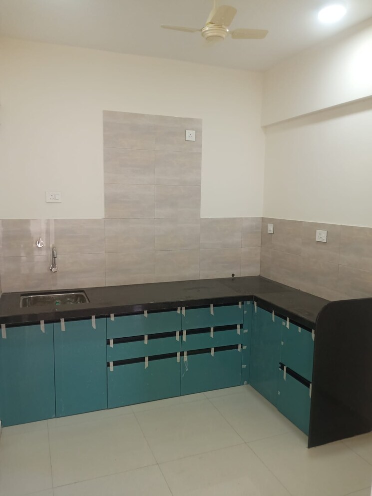 Kitchen, saarrthi-skybay 2 Bedroom 919 Sq.Ft. Apartment In Mahalunge Pune 9308736