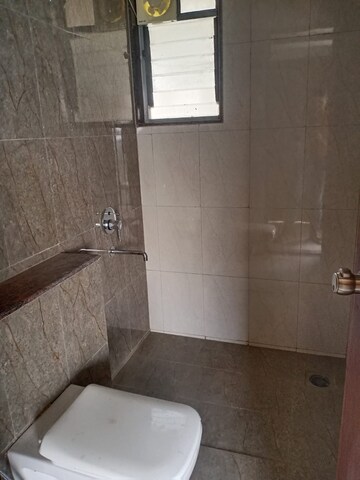 Bathroom in 2 BHK Apartment at Saarrthi Skybay, Mahalunge – for Rent