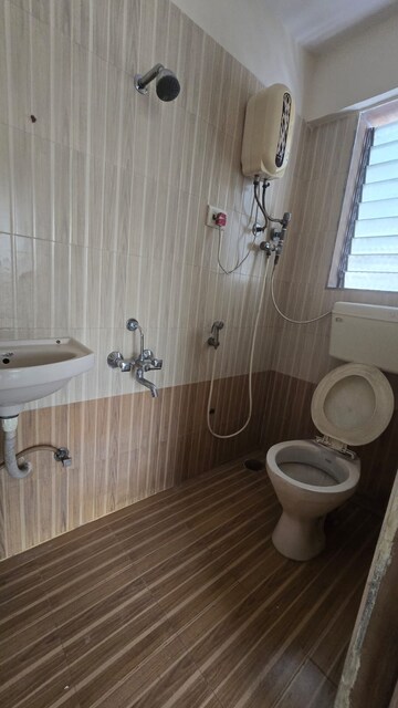 Bathroom in 1 BHK Apartment at JS Bal Ganesh Tower, Naupada – for Sale