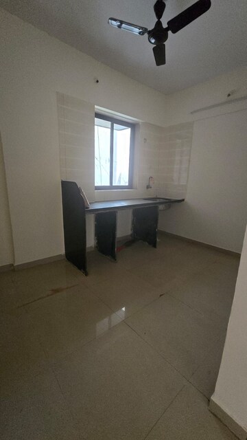 Kitchen in 1 BHK Apartment at JS Bal Ganesh Tower, Naupada – for Sale