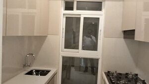 Kitchen in 1 BHK Builder Floor at Vihang Tower, Ghodbunder Road – for Sale