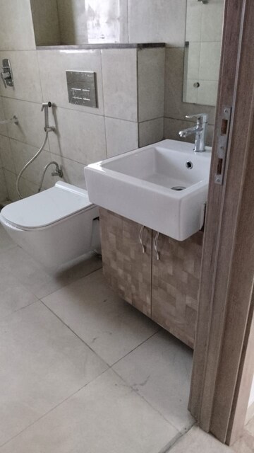 Bathroom in 3 BHK Apartment at Adani M2K Oyster Grande, Sector 102 – for Sale