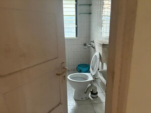 Bathroom in 2 BHK Apartment at Powai Cosmopolitan CHS, Powai – for Rent