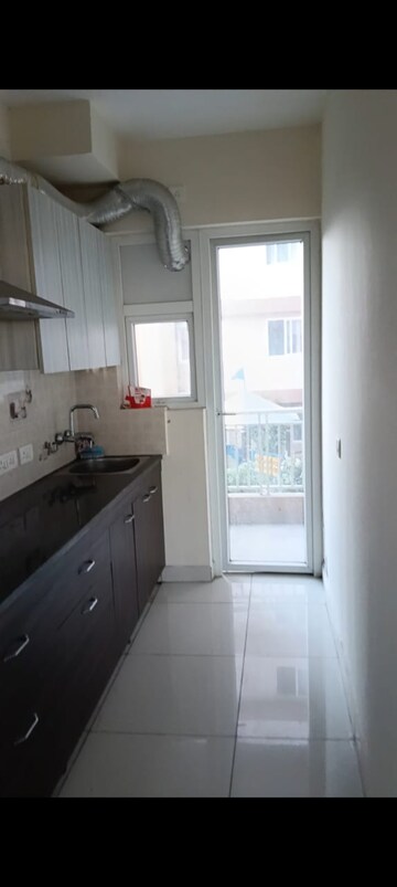Kitchen in 2 BHK Apartment at Windlass River Valley, Harrawala – for Rent