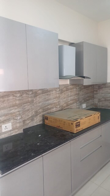 Kitchen in 3 BHK Apartment at Adani M2K Oyster Grande, Sector 102 – for Sale