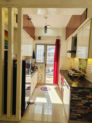 Kitchen in 2 BHK Apartment at Gulshan Bellina, Sector 16 Greater Noida – for Rent