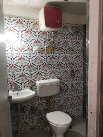 Bathroom in 1 BHK Apartment at NK Sharma Savitry Greens, Vip Road – for Rent
