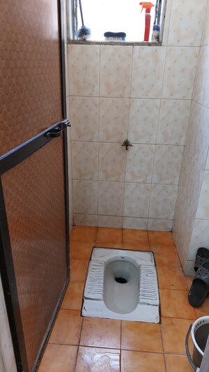 Bathroom in 3 BHK Apartment at Sudarshan Sky Garden, Ghodbunder Road – for Rent