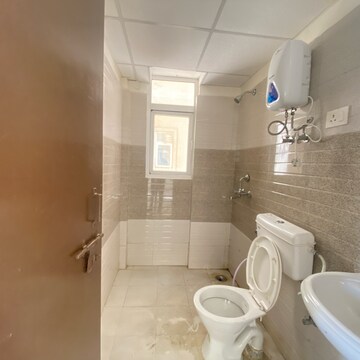Bathroom in 2 BHK Apartment at Signature Global Orchard Avenue, Sector 93 – for Rent