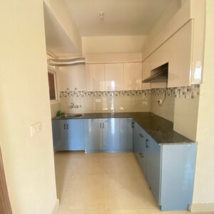 Kitchen in 2 BHK Apartment at Signature Global Orchard Avenue, Sector 93 – for Rent