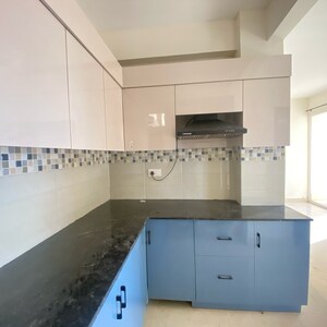 Kitchen in 2 BHK Apartment at Signature Global Orchard Avenue, Sector 93 – for Rent