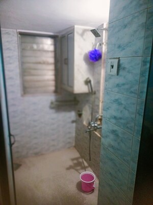 Bathroom in 1 BHK Apartment at Ahimsa Appa CHS, Malad West – for Rent