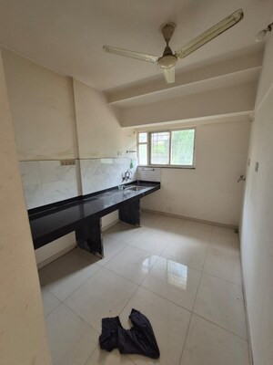 Kitchen in 1 BHK Apartment at Heena Vijaya Residency, Kharadi – for Rent