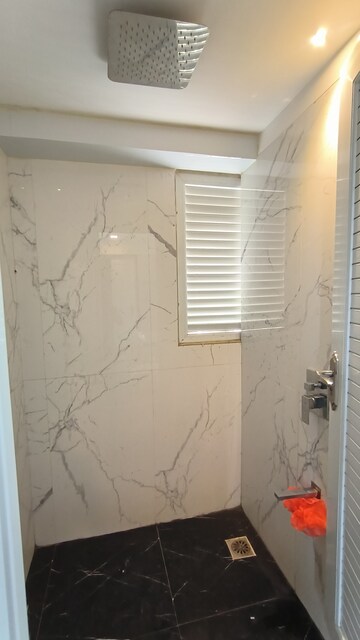 Bathroom in 2 BHK Apartment at Ruparel Ariana, Parel – for Rent
