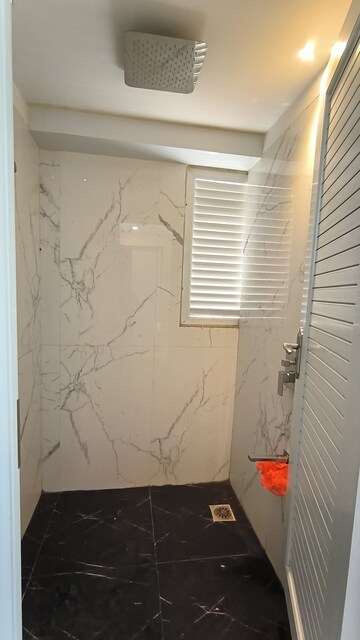 Bathroom in 2 BHK Apartment at Ruparel Ariana, Parel – for Rent