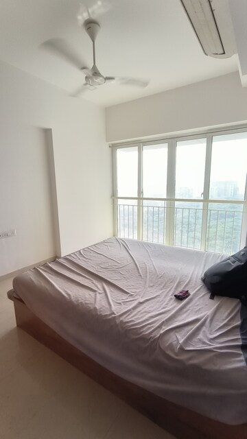Bedroom in 2 BHK Apartment at Ruparel Ariana, Parel – for Rent