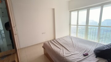 Bedroom in 2 BHK Apartment at Ruparel Ariana, Parel – for Rent