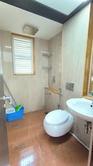 Bathroom in 2 BHK Apartment at Ruparel Ariana, Parel – for Rent