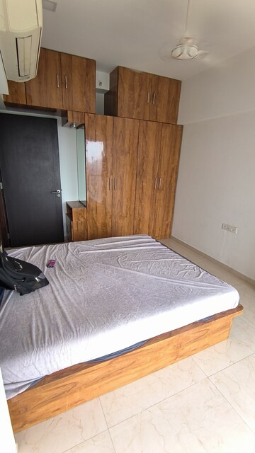 Bedroom in 2 BHK Apartment at Ruparel Ariana, Parel – for Rent
