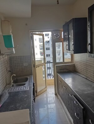 Kitchen in 2 BHK Apartment at Nimbus The Hyde park, Sector 78 – for Rent