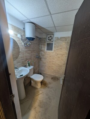 Bathroom in 2 BHK Apartment at Ajnara Homes, Sector 16b Greater Noida – for Rent