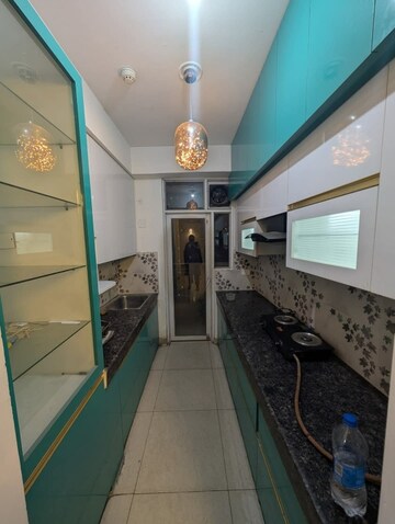 Kitchen in 2 BHK Apartment at Ajnara Homes, Sector 16b Greater Noida – for Rent