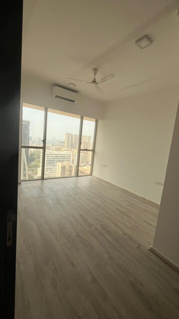 Room in 2 BHK Apartment at Transcon Triumph Tower, Andheri West – for Rent