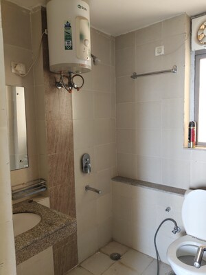 Bathroom in 2 BHK Apartment at Unitech Uniworld Gardens 2, Sector 47 – for Rent