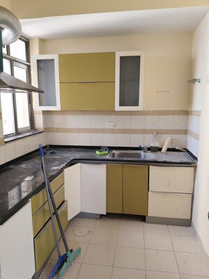 Kitchen in 2 BHK Apartment at Unitech Uniworld Gardens 2, Sector 47 – for Rent