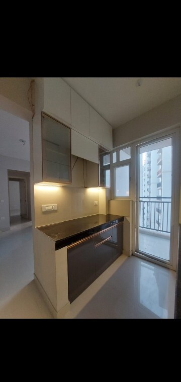 Kitchen in 2 BHK Apartment at Eldeco Live By The Greens, Sector 150 – for Rent