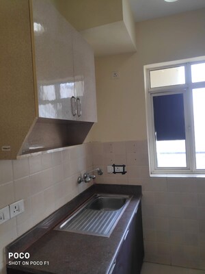 Kitchen in 2 BHK Apartment at Satya The Hermitage Phase 2, Sector 103 – for Rent