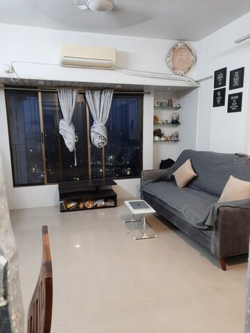 Living Room in 2 BHK Apartment at Runwal Garden City, Balkum Pada – for Sale