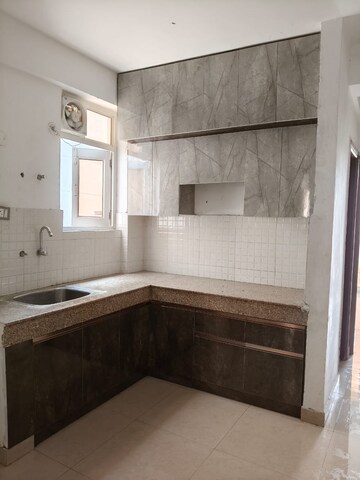 Kitchen in 2 BHK Apartment at MRG The Balcony, Sector 93 – for Rent