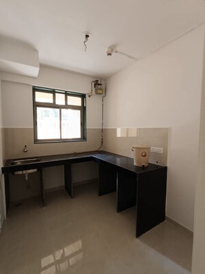 Kitchen in 1 BHK Apartment at Hiranandani Estate Villa Carino, Thane West – for Rent