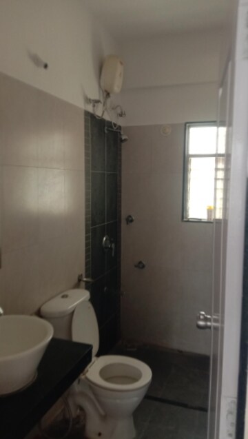 Bathroom in 2 BHK Apartment at Rama Celestial City, Ravet – for Rent