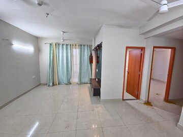 Living Room in 2.5 BHK Apartment at Tata Eureka Park, Sector 150 – for Rent