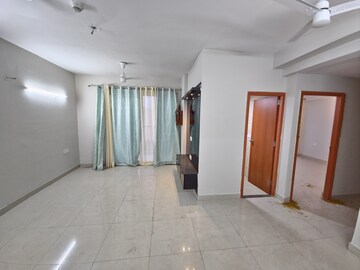Living Room in 2.5 BHK Apartment at Tata Eureka Park, Sector 150 – for Rent