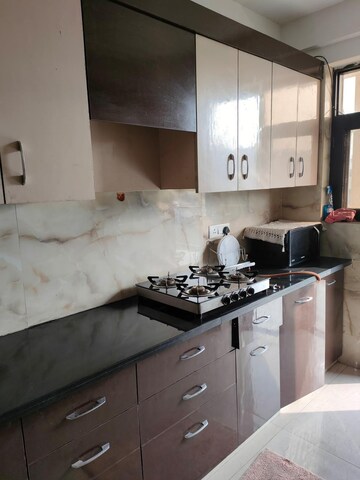 Kitchen in 2 BHK Apartment at TDI Ourania, Sector 53 – for Sale