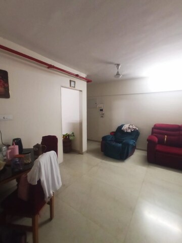 Living Room in 2 BHK Apartment at Dosti West County, Balkum Pada – for Sale