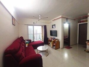 Living Room in 2 BHK Apartment at Dosti West County, Balkum Pada – for Sale
