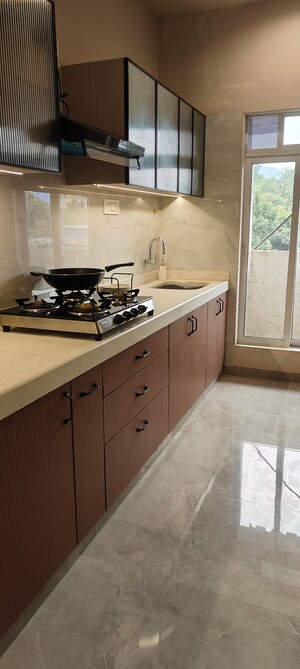 Kitchen in 1.5 BHK Apartment at Godrej Emerald, Ghodbunder Road – for Sale