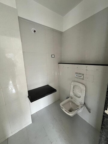Bathroom in 3 BHK Apartment at Kotibhaskar Kajal CHS, Kothrud – for Sale