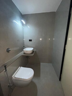 Bathroom in 4 BHK Apartment at Kusum Kunj, Prabhat Road – for Sale