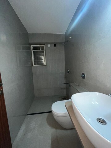 Bathroom in 4 BHK Apartment at Kusum Kunj, Prabhat Road – for Sale