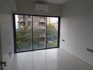 Room in 2 BHK Apartment at Rustomjee Paramount, Khar West – for Rent
